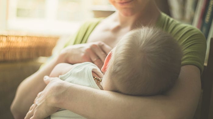 Learn How to Get a Baby to Latch While Breastfeeding